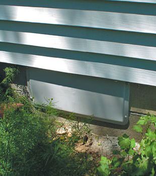 A gray crawl space vent cover in Silverthorne