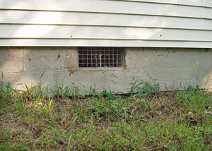 Open crawl space vents that let rodents, termites, and other pests in a home in Leadville